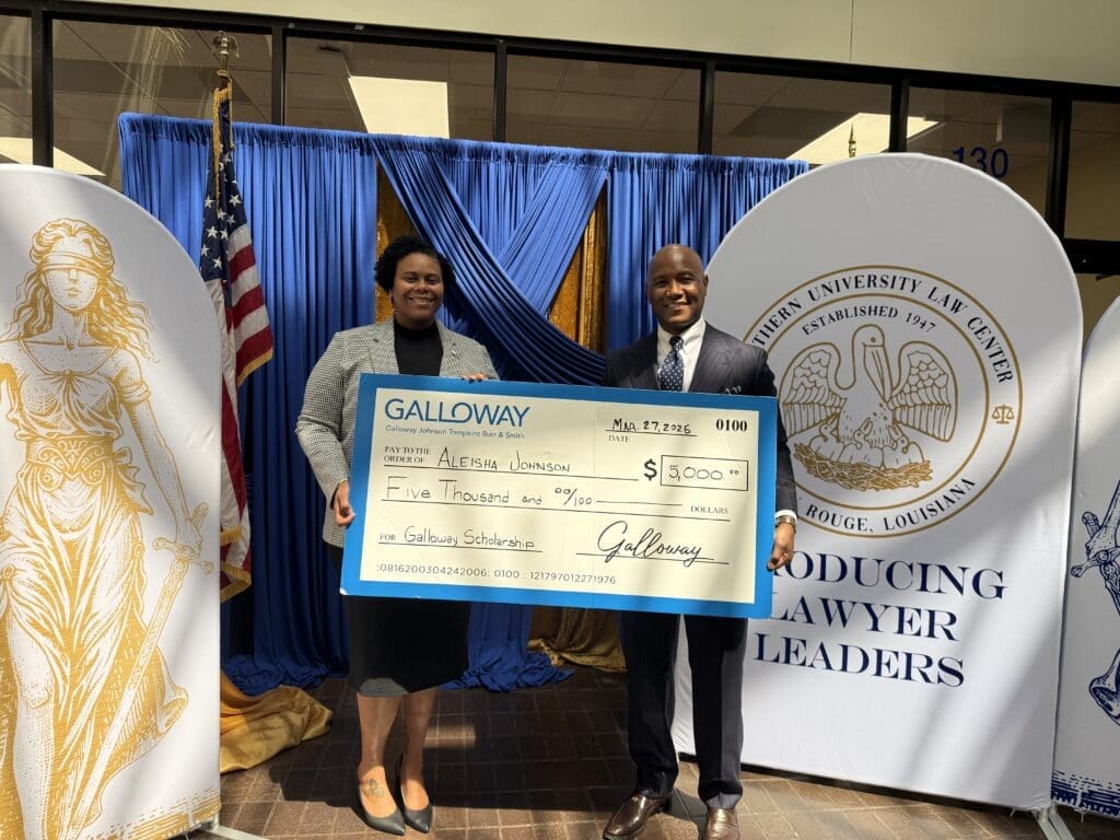 Galloway Director Adraon Greene presents scholarship to Aleisha Johnson